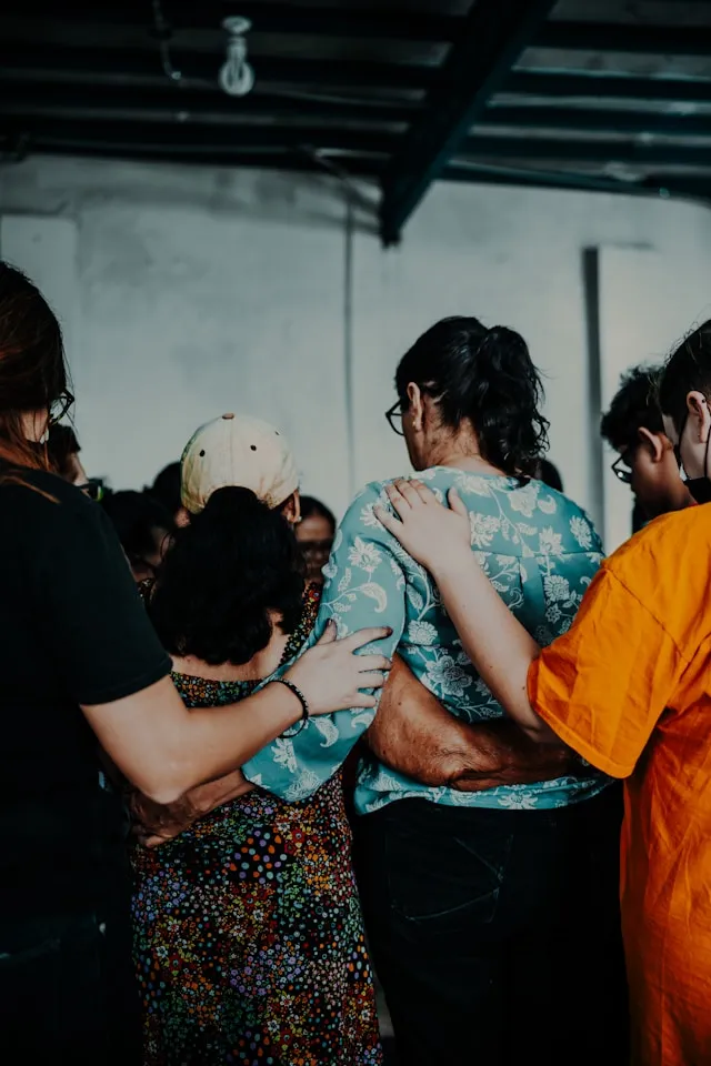 people praying together